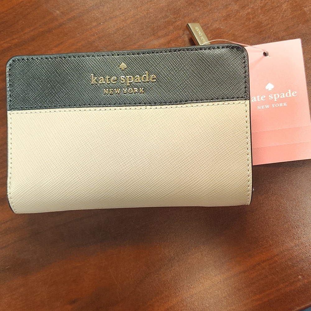 Brand New Kate Spade bifold wallet tan with black Trim